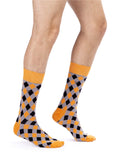 Schwarz-orangefarbene Socken mit Argyles-Design